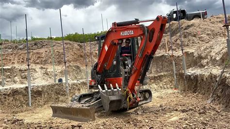 how to put a track back on a mini excavator|lifting tracks for mini excavators.